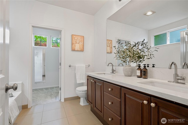 1741 12th Ave NE, Issaquah, WA 98029 - full bathroom featuring a sink, a wealth of natural light, and toilet
