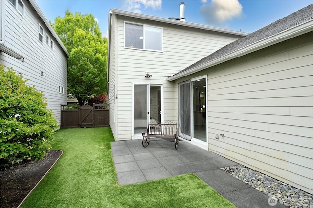 1741 12th Ave NE, Issaquah, WA 98029 - back of house featuring a patio, a gate, a yard, and a shingled roof