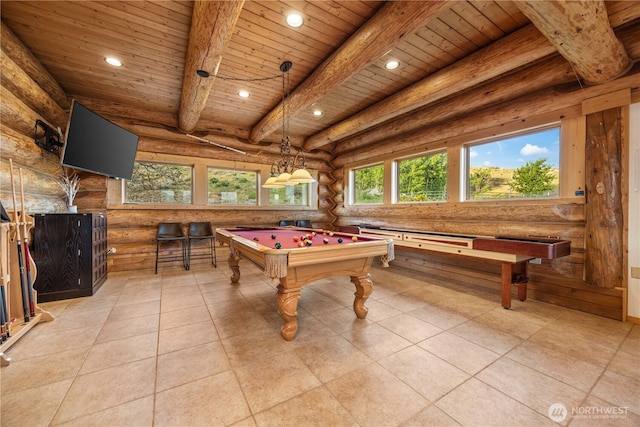 playroom with wood ceiling, beam ceiling, recessed lighting, and log walls