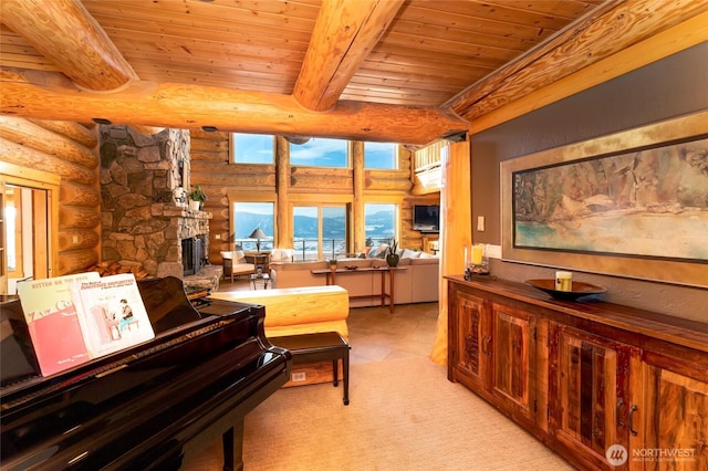 living area with a stone fireplace, log walls, beam ceiling, and wooden ceiling