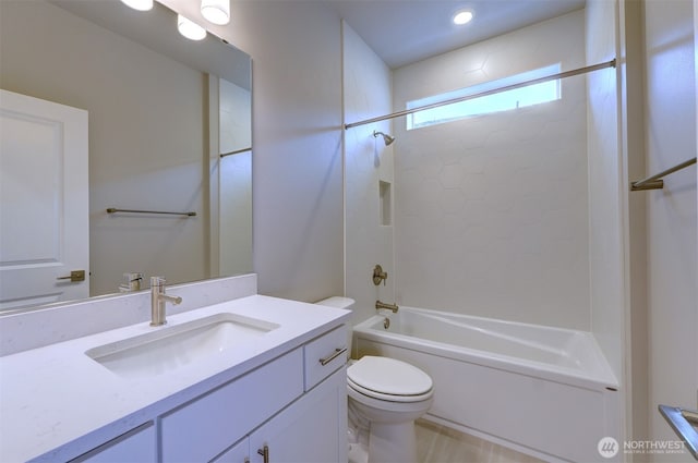 full bathroom with vanity, toilet, and  shower combination