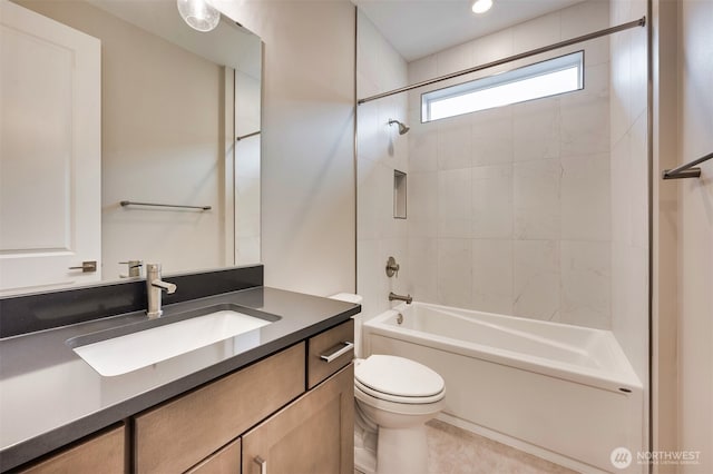 full bathroom featuring vanity,  shower combination, and toilet
