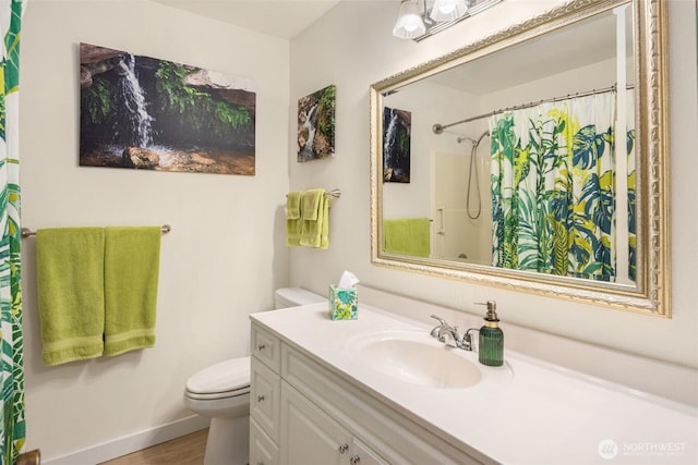 full bathroom with vanity, wood finished floors, toilet, and curtained shower