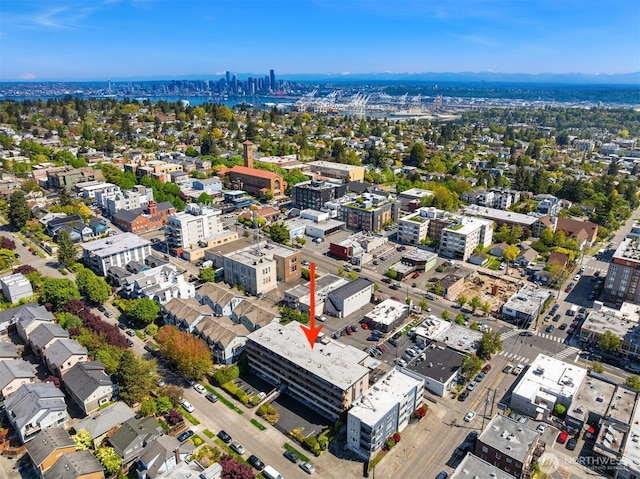 birds eye view of property featuring a city view