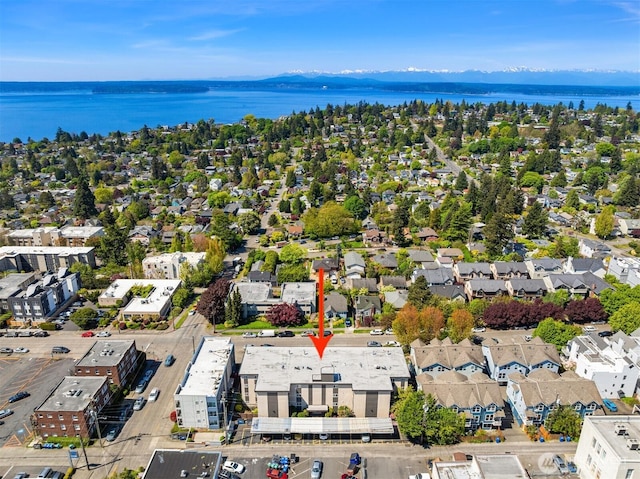 aerial view with a residential view and a water view