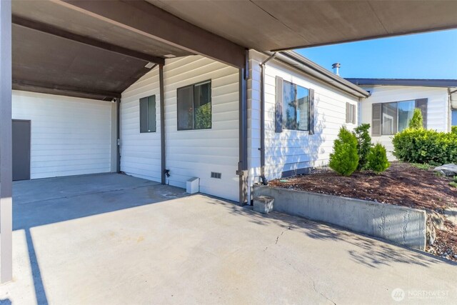 view of home's exterior with crawl space