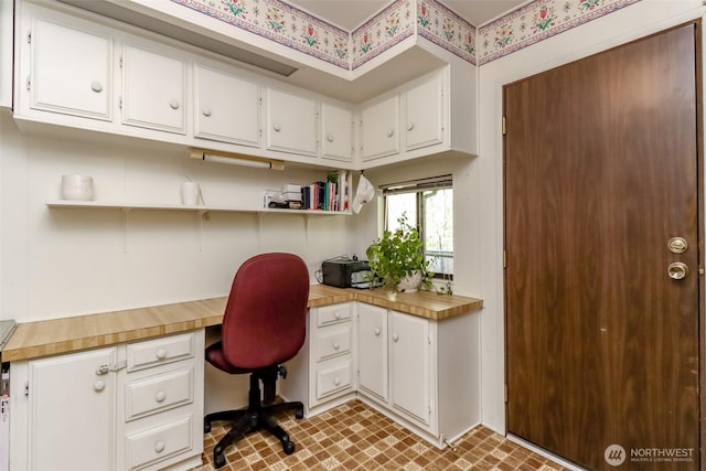 office area featuring built in desk