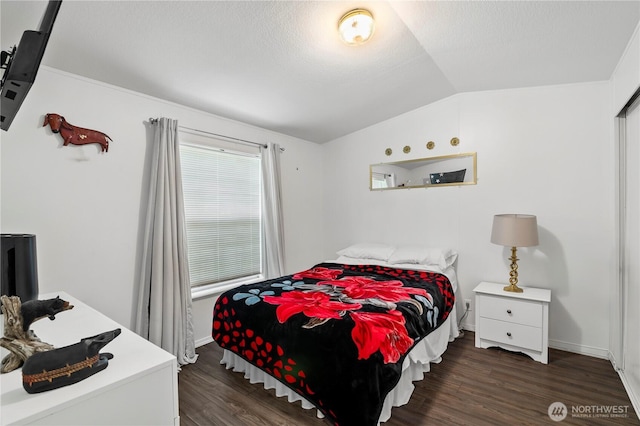 20323 Jordan Rd, Arlington, WA 98223 - bedroom featuring vaulted ceiling, dark wood finished floors, and baseboards