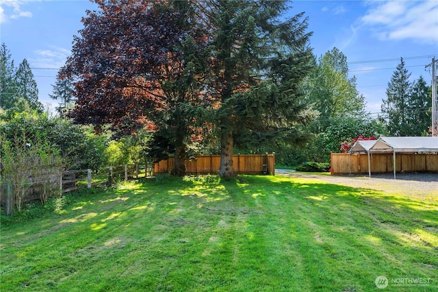 20323 Jordan Rd, Arlington, WA 98223 - view of yard featuring a carport and dirt driveway