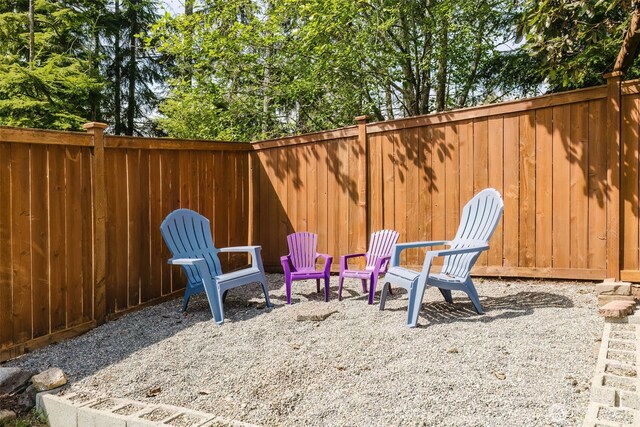 view of yard featuring a patio and fence