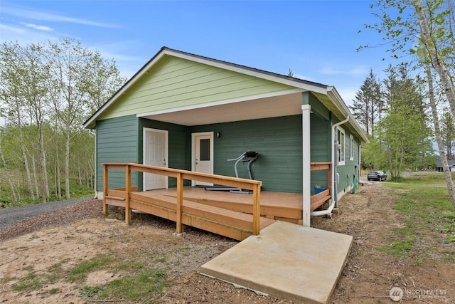 rear view of house with a deck
