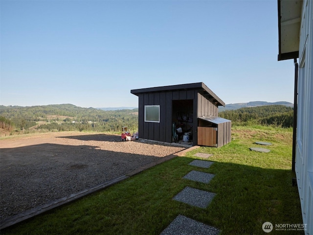 159 Bootjack Ln, Kelso, WA 98626 - view of yard featuring a mountain view and an outbuilding