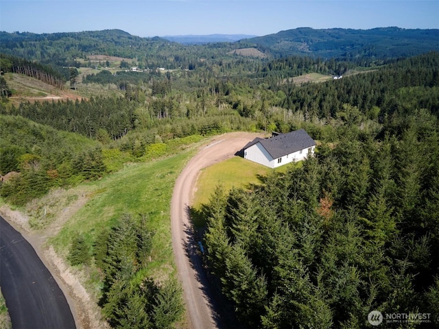159 Bootjack Ln, Kelso, WA 98626 - birds eye view of property featuring a wooded view and a mountain view