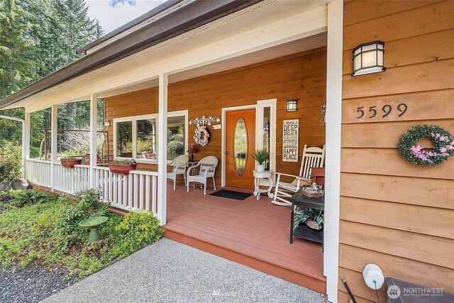 entrance to property with a porch