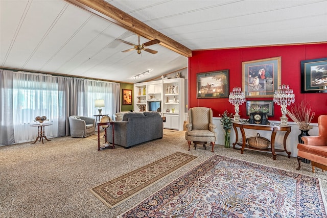 living area with carpet floors and ceiling fan