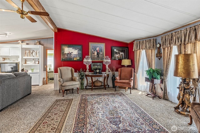 sitting room with carpet floors and a ceiling fan