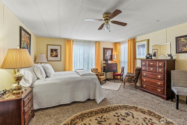 bedroom with carpet flooring and a ceiling fan