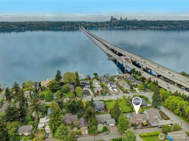 aerial view featuring a residential view and a water view