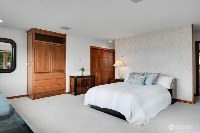 bedroom featuring recessed lighting, baseboards, and light carpet