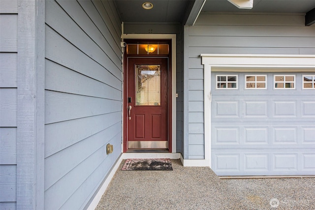 entrance to property featuring a garage