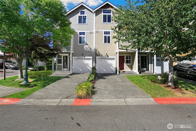 11406 SE 171st St Unit 14, Renton, WA 98058 - townhome / multi-family property featuring an attached garage and driveway