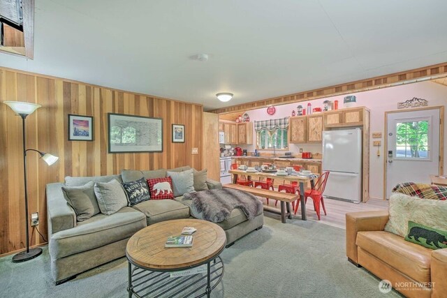 124 Aspen Ln, Packwood, WA 98361 - living room with light colored carpet and wood walls