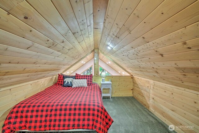 124 Aspen Ln, Packwood, WA 98361 - carpeted bedroom with wood ceiling, wooden walls, and vaulted ceiling