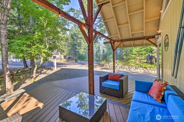 124 Aspen Ln, Packwood, WA 98361 - wooden deck with an outdoor hangout area
