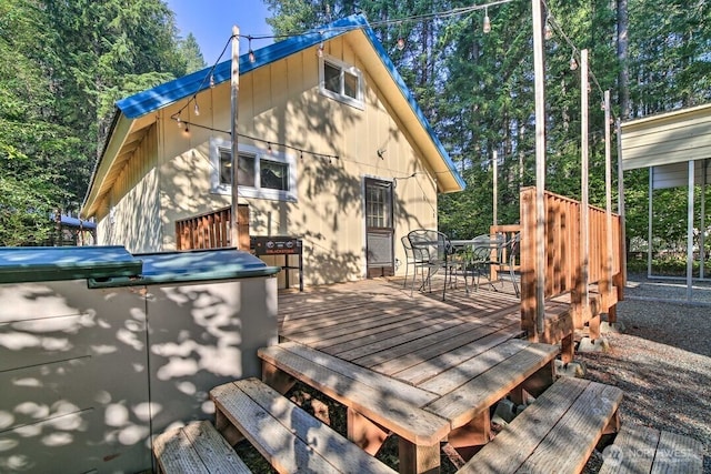 124 Aspen Ln, Packwood, WA 98361 - rear view of house with a deck and outdoor dining area