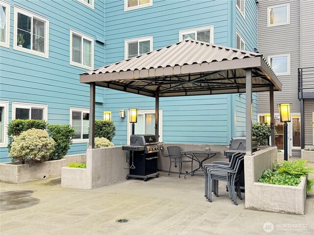 view of patio featuring a gazebo and grilling area