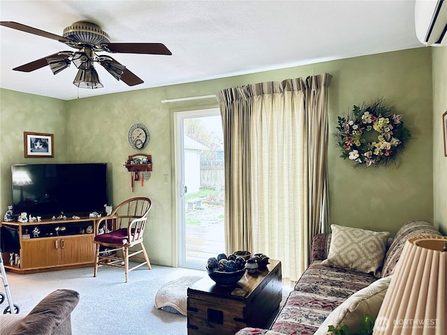 living area with light colored carpet, ceiling fan, and a wall unit AC