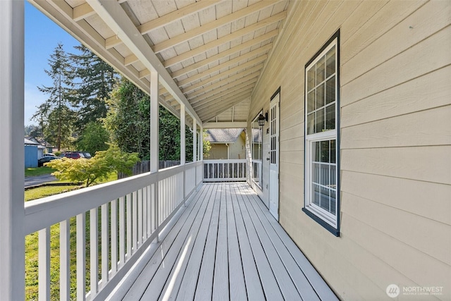 wooden terrace featuring a porch