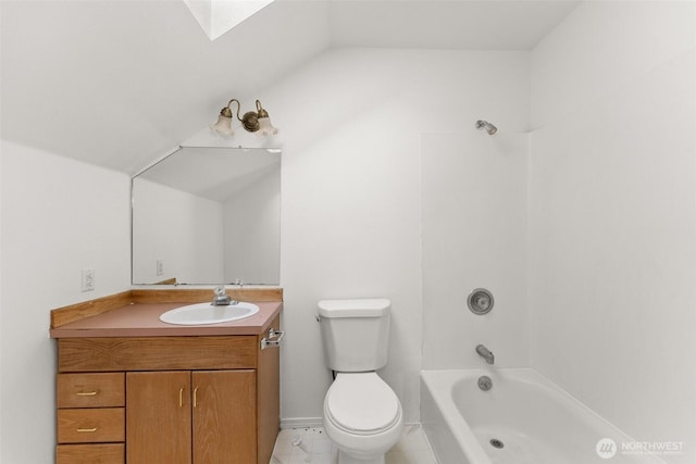 full bath with tile patterned flooring, bathtub / shower combination, vanity, toilet, and lofted ceiling with skylight