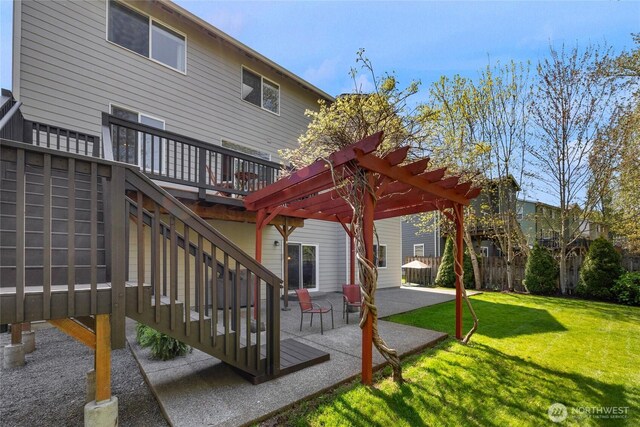 back of house featuring a deck, stairway, a yard, a patio, and a pergola
