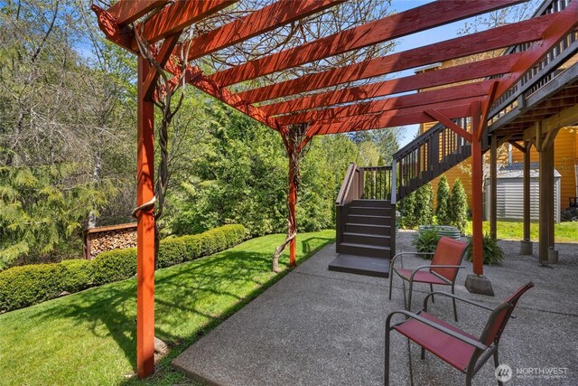 view of patio / terrace with a storage unit, a pergola, an outdoor structure, and stairway
