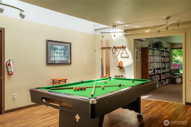 rec room with baseboards, billiards, and wood finished floors