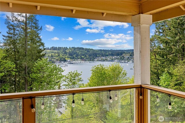 property view of water featuring a view of trees
