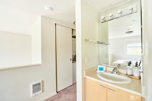 425 Vine St Unit 709, Seattle, WA 98121 - bathroom featuring vanity, heating unit, and ensuite bath