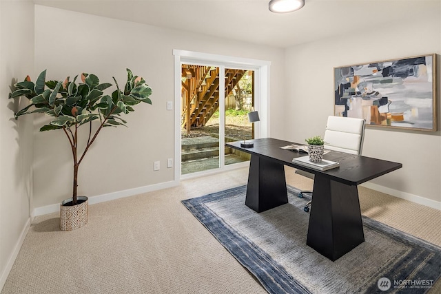 home office with carpet and baseboards