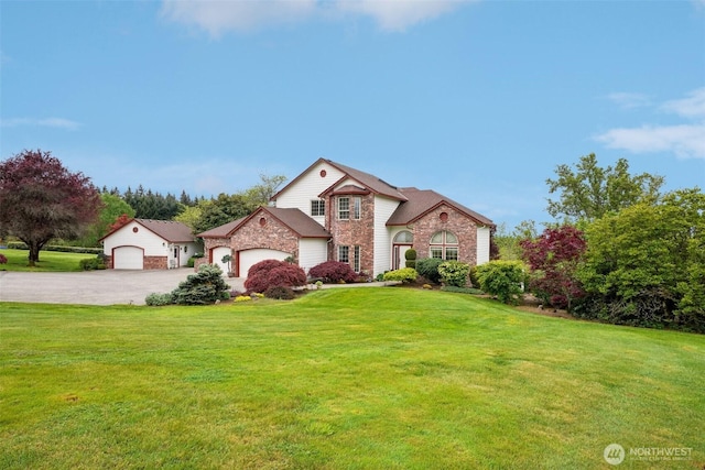 17600 NE 188th Ct, Brush Prairie, WA 98606 - view of front of property featuring an attached garage, a front yard, stone siding, and concrete driveway