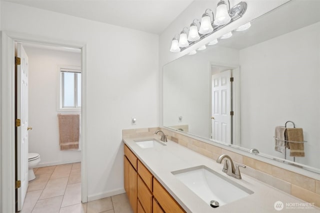 17600 NE 188th Ct, Brush Prairie, WA 98606 - full bath featuring tile patterned flooring, a sink, double vanity, and toilet