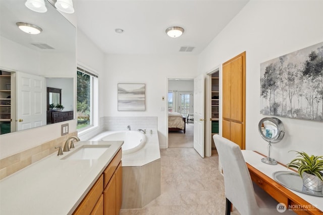17600 NE 188th Ct, Brush Prairie, WA 98606 - ensuite bathroom featuring a bathtub, visible vents, ensuite bathroom, and vanity