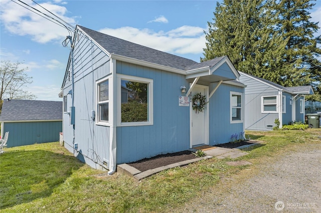 10704 5th Ave S, Tacoma, WA 98444 - bungalow with a front lawn and roof with shingles