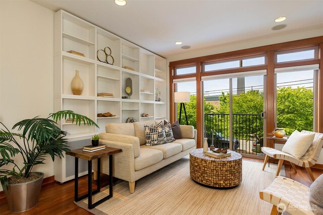 sitting room featuring recessed lighting and wood finished floors