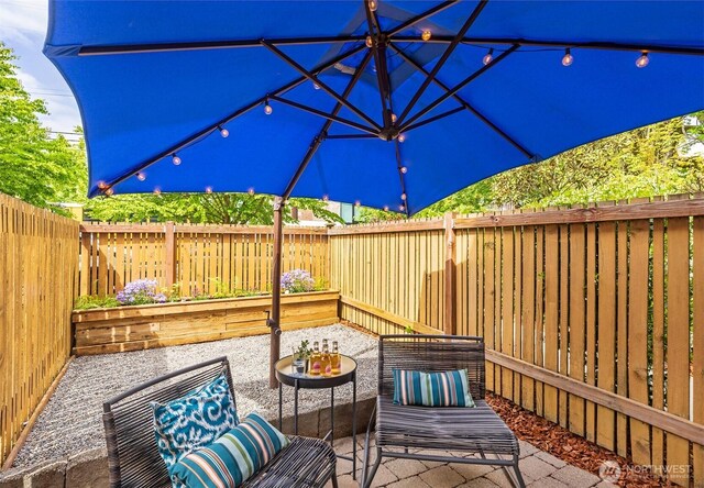 view of patio with a fenced backyard