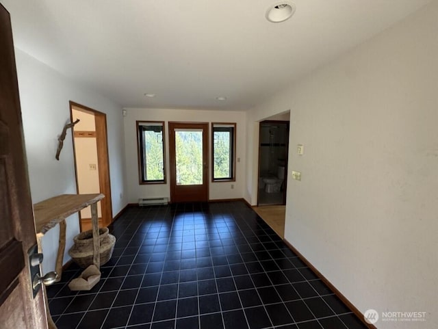 1052 Vusario Ln, Orcas Island, WA 98245 - doorway to outside featuring recessed lighting, tile patterned floors, baseboards, and a baseboard heating unit