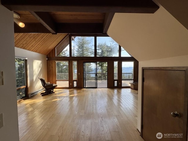 1052 Vusario Ln, Orcas Island, WA 98245 - additional living space with a wealth of natural light, high vaulted ceiling, beam ceiling, and wood finished floors