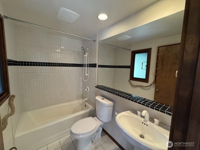 1052 Vusario Ln, Orcas Island, WA 98245 - bathroom featuring toilet, tile patterned flooring, bathtub / shower combination, and a sink