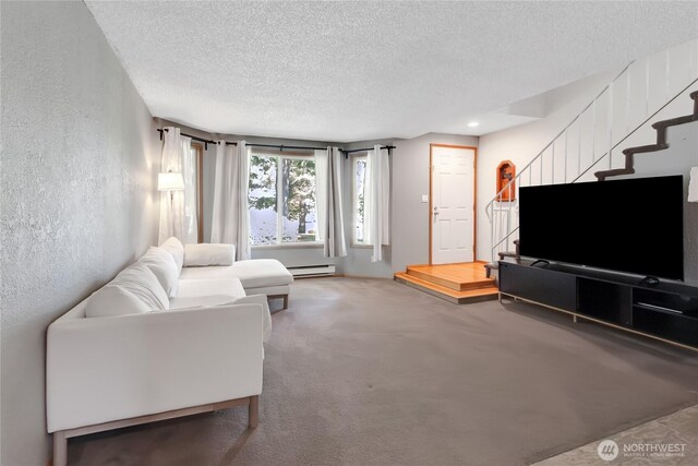 living room with a textured wall, a textured ceiling, carpet, stairs, and a baseboard radiator