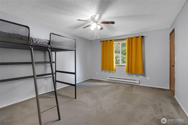 unfurnished bedroom featuring baseboards, carpet flooring, a textured ceiling, and a baseboard heating unit
